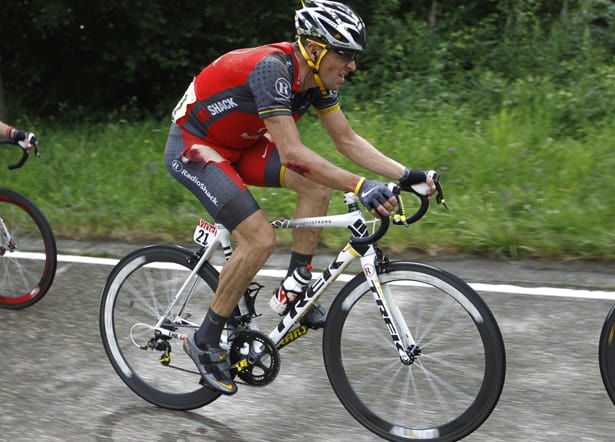 US Lance Armstrong rides after crashing US Lance Armstrong rides after crashing
