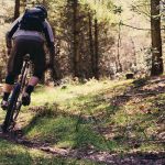 Mountain biking on wet trail Mountain biking on wet trail